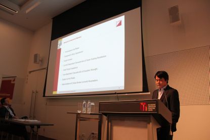 Hai Le at the lecturn